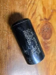 610807-049 Capacitor 108-130UF, 165VAC, Used-tested Good. Fixed Price $13.00.