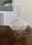 Vtg Astral Bovary Crystal Cut Decanter Stopper& Brass 2000 Millennium Stand. Fixed Price $125.00.