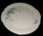 Taylor Smith #1393 Plymouth Pink Body Blue Bell Handled Cake Plate (73F). Fixed Price $19.99.